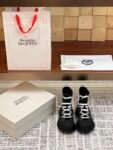 Alexander Mcqueen Tread Slick Martin Boots Black and White