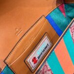 Gucci bag GG Mini Leather-Trimmed Monogrammed Coated-Canvas 723762