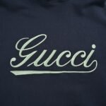 Gucci Cursive embroidered lettering hoodie