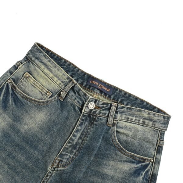 Louis Vuitton Pumpkin embroidered jeans