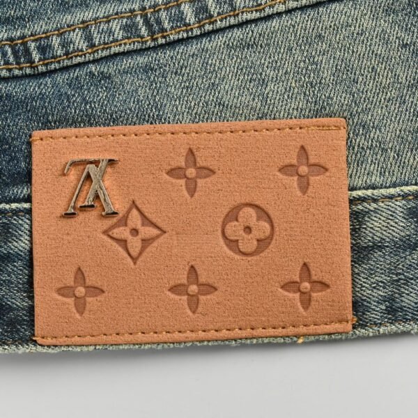 Louis Vuitton Pumpkin embroidered jeans