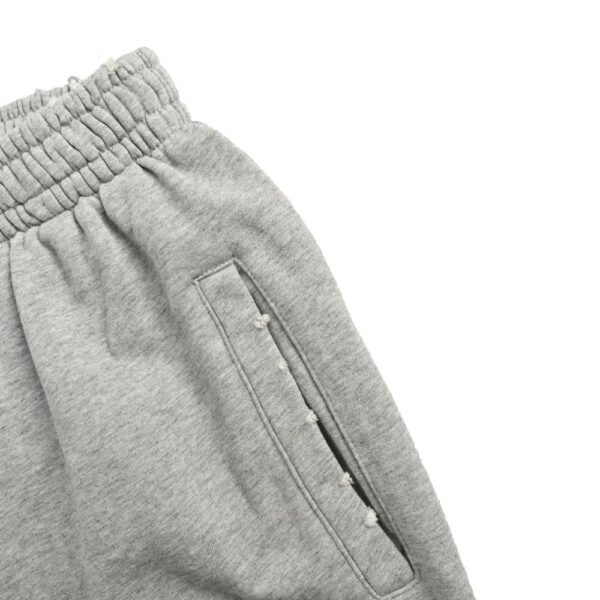 Balenciaga Earth print washed distressed trousers