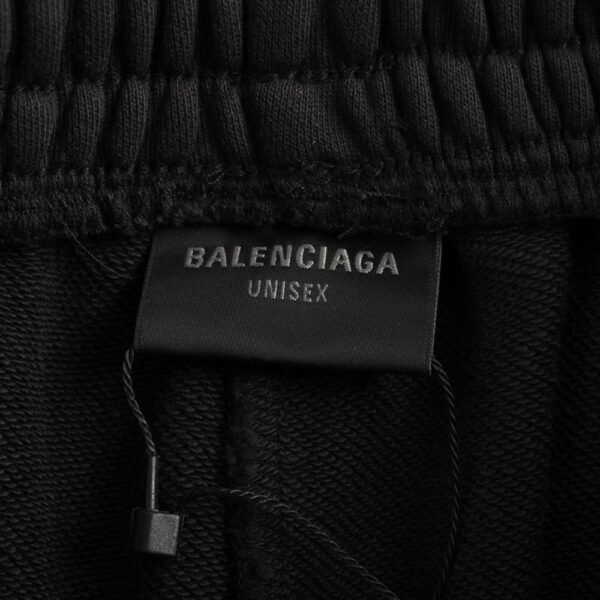 Balenciaga Earth print washed distressed trousers