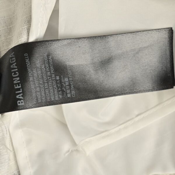 Balenciaga Camouflage trousers with detachable pockets