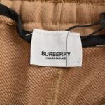 Prada 24Fw Back Pocket Warhorse Patched Trousers