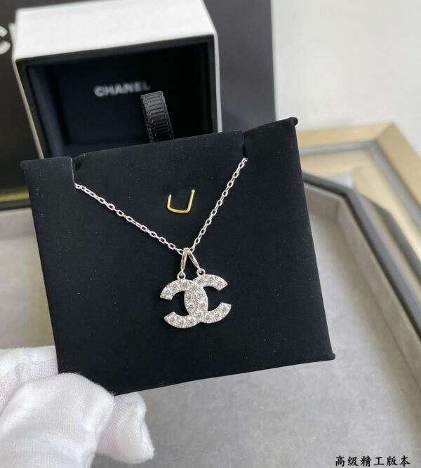 Chanel earrings and necklace