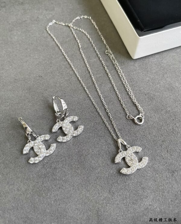 Chanel earrings and necklace