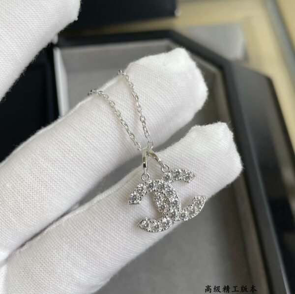 Chanel earrings and necklace