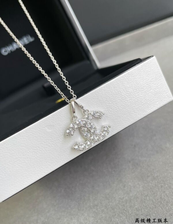 Chanel earrings and necklace